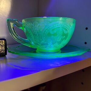 Indiana Glass Horseshoe green uranium glass cup and saucer from the 1930s